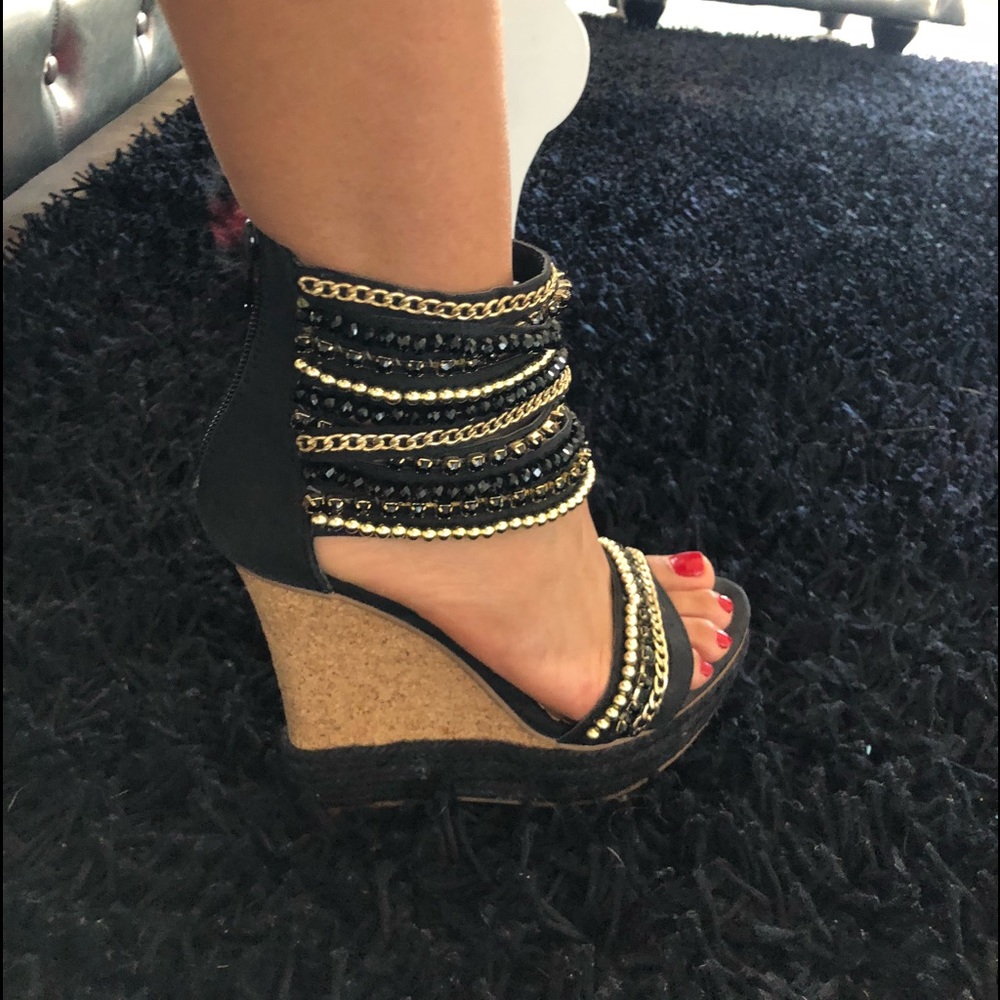 Black Sandals with decorated chains.